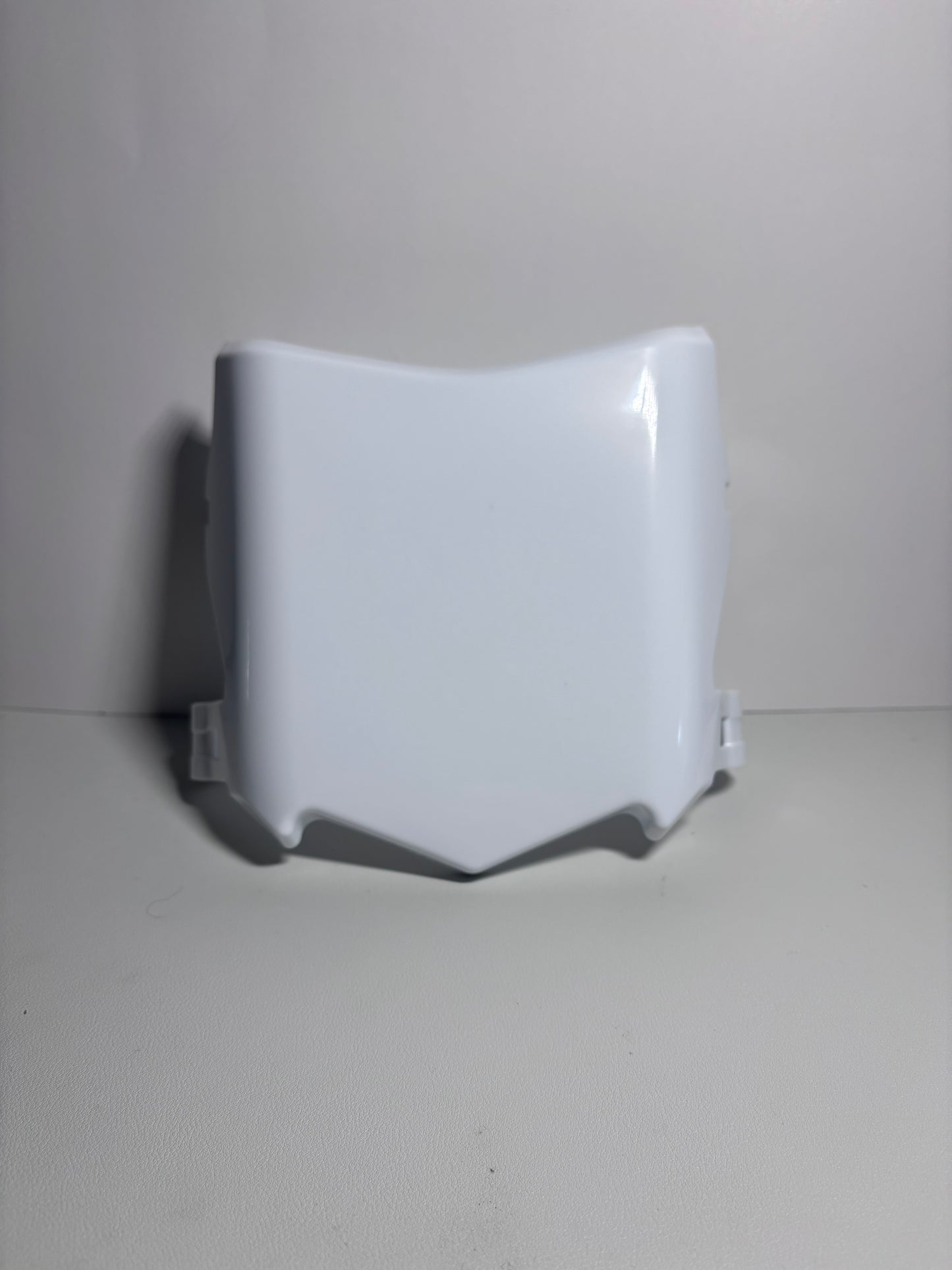 Glossy moto cuts plate